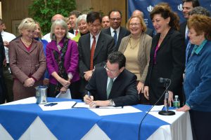 Gov. Dannel P. Malloy during a ceremonial bill signing at the Health Center after a final agreement was reached between the state and Jackson Laboratory. (Tina Encarnacion/UConn Health Center Photo)